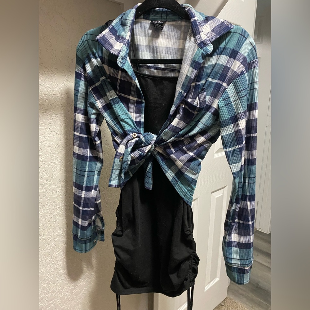 Little black dress paired with flannel